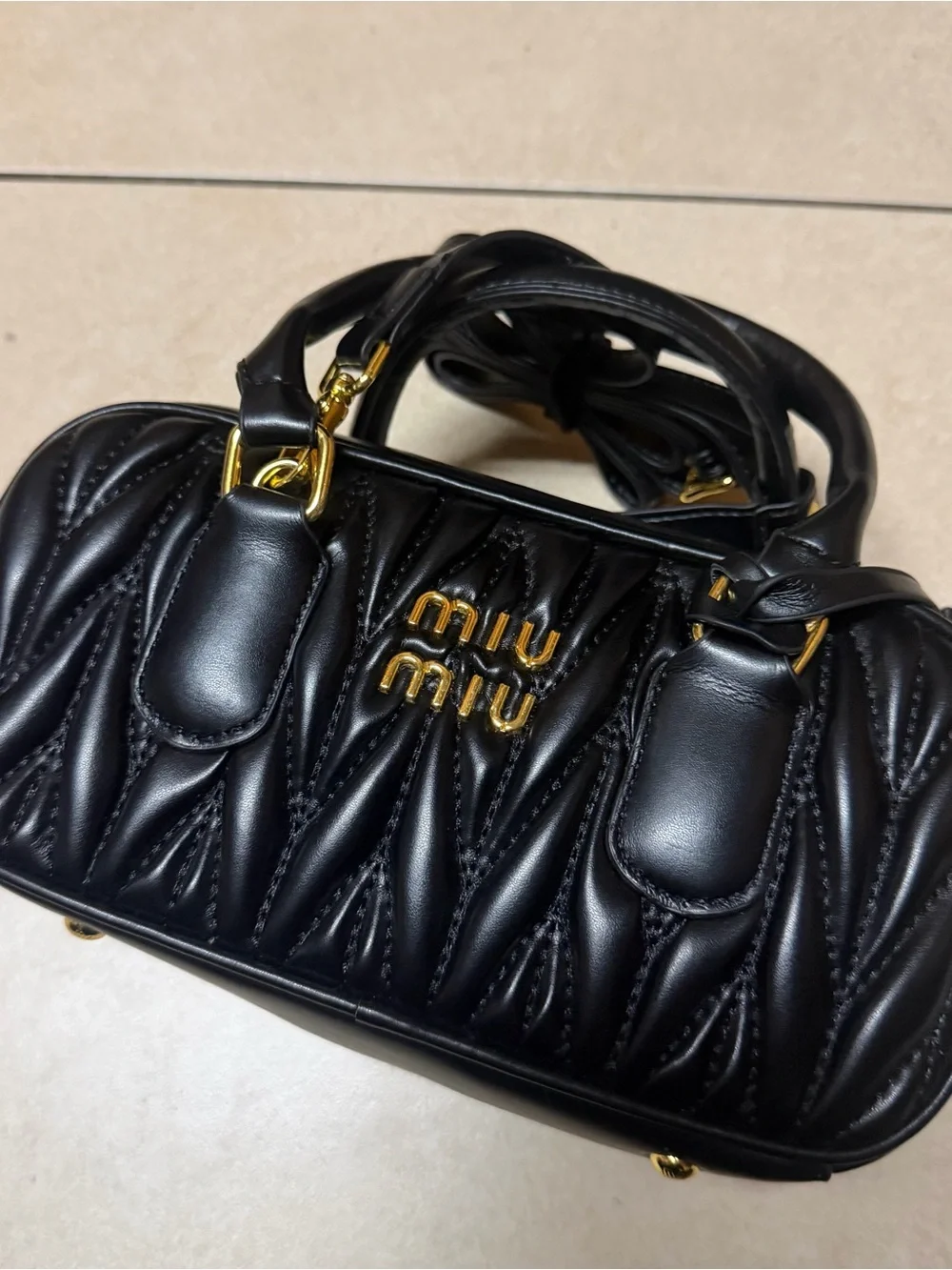 Miu Miu Black Quilted Leather Satchel with Gold Hardware